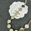 692ffd4099f2d84055c8e8be Xiaoxiang New Arrival White Oil-Drop Double C Round Mirror Clover Pendant Necklace with Smooth Chain