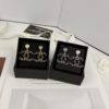692ffd5599f2d84055c8e8d7 Xiaoxiang New Arrival Gold and Silver Two-Tone Luxury Double C Leather-Embedded Earrings
