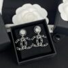 692ffd5999f2d84055c8e8dc Xiaoxiang New Arrival Gold and Silver Two-Tone Luxury Double C Leather-Embedded Earrings