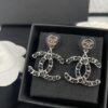 692ffd5a99f2d84055c8e8dd Xiaoxiang New Arrival Gold and Silver Two-Tone Luxury Double C Leather-Embedded Earrings