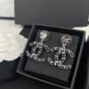 692ffd5b99f2d84055c8e8de Xiaoxiang New Arrival Gold and Silver Two-Tone Luxury Double C Leather-Embedded Earrings