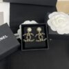 692ffd5b99f2d84055c8e8df Xiaoxiang New Arrival Gold and Silver Two-Tone Luxury Double C Leather-Embedded Earrings