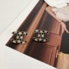 692ffd8499f2d84055c8e91b Xiaoxiang New Arrival Black Drip Oil Rhinestone Classic Earrings, Available in Gold and Silver