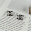 692ffd8599f2d84055c8e91c Xiaoxiang New Arrival Black Drip Oil Rhinestone Classic Earrings, Available in Gold and Silver