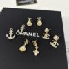 New Xiaoxiang Ocean Series Light Gold Pearl Shell Full Diamond Double C Pendant Earrings