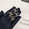 692ffdc999f2d84055c8e969 Xiaoxiang New Arrival Black Drip Oil Rhinestone Classic Earrings, Available in Gold and Silver