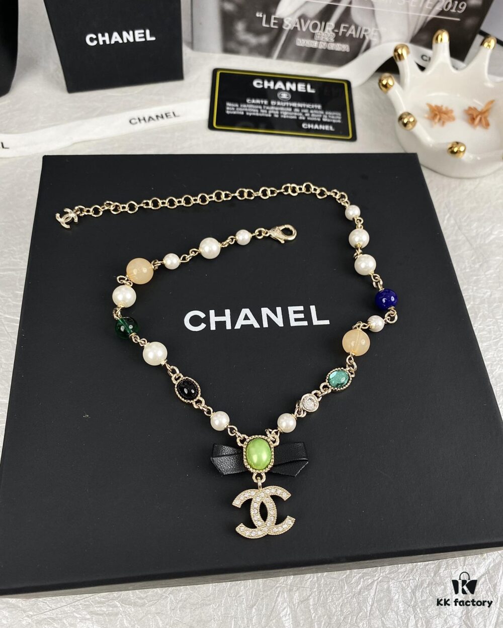692ffdd599f2d84055c8e97b Xiaoxiang New Arrival Black Ribbon Bow with Green Pearl Pendant, Colorful Paved Diamond Necklace