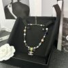 692ffdd599f2d84055c8e97c Xiaoxiang New Arrival Black Ribbon Bow with Green Pearl Pendant, Colorful Paved Diamond Necklace