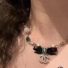 692ffdd999f2d84055c8e981 Xiaoxiang New Arrival Black Ribbon Bow with Green Pearl Pendant, Colorful Paved Diamond Necklace
