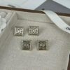 692ffddb99f2d84055c8e984 Xiaoxiang New Arrival Square Smooth Black/White Drip Edge Hollow Double C Stud Earrings (Available in Two Colors)