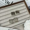 692ffddc99f2d84055c8e985 Xiaoxiang New Arrival Square Smooth Black/White Drip Edge Hollow Double C Stud Earrings (Available in Two Colors)