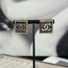 692ffde199f2d84055c8e98c Xiaoxiang New Arrival Square Smooth Black/White Drip Edge Hollow Double C Stud Earrings (Available in Two Colors)