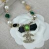 692ffde299f2d84055c8e98d Xiaoxiang New Arrival Black Ribbon Bow with Green Pearl Pendant, Colorful Paved Diamond Necklace
