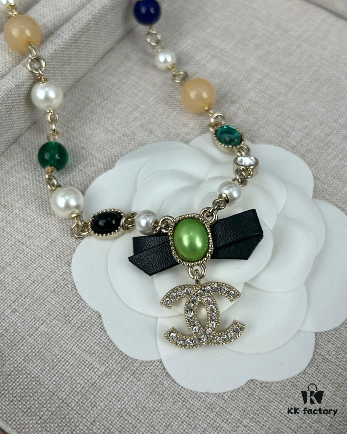 692ffde299f2d84055c8e98d Xiaoxiang New Arrival Black Ribbon Bow with Green Pearl Pendant, Colorful Paved Diamond Necklace