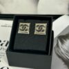 692ffde699f2d84055c8e995 Xiaoxiang New Arrival Square Smooth Black/White Drip Edge Hollow Double C Stud Earrings (Available in Two Colors)
