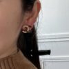 692ffe2d99f2d84055c8e9e3 Xiaoxiang New Arrival Enamel Black and Gold Two-Tone Double C Stud Earrings Minimalist ✨✨
