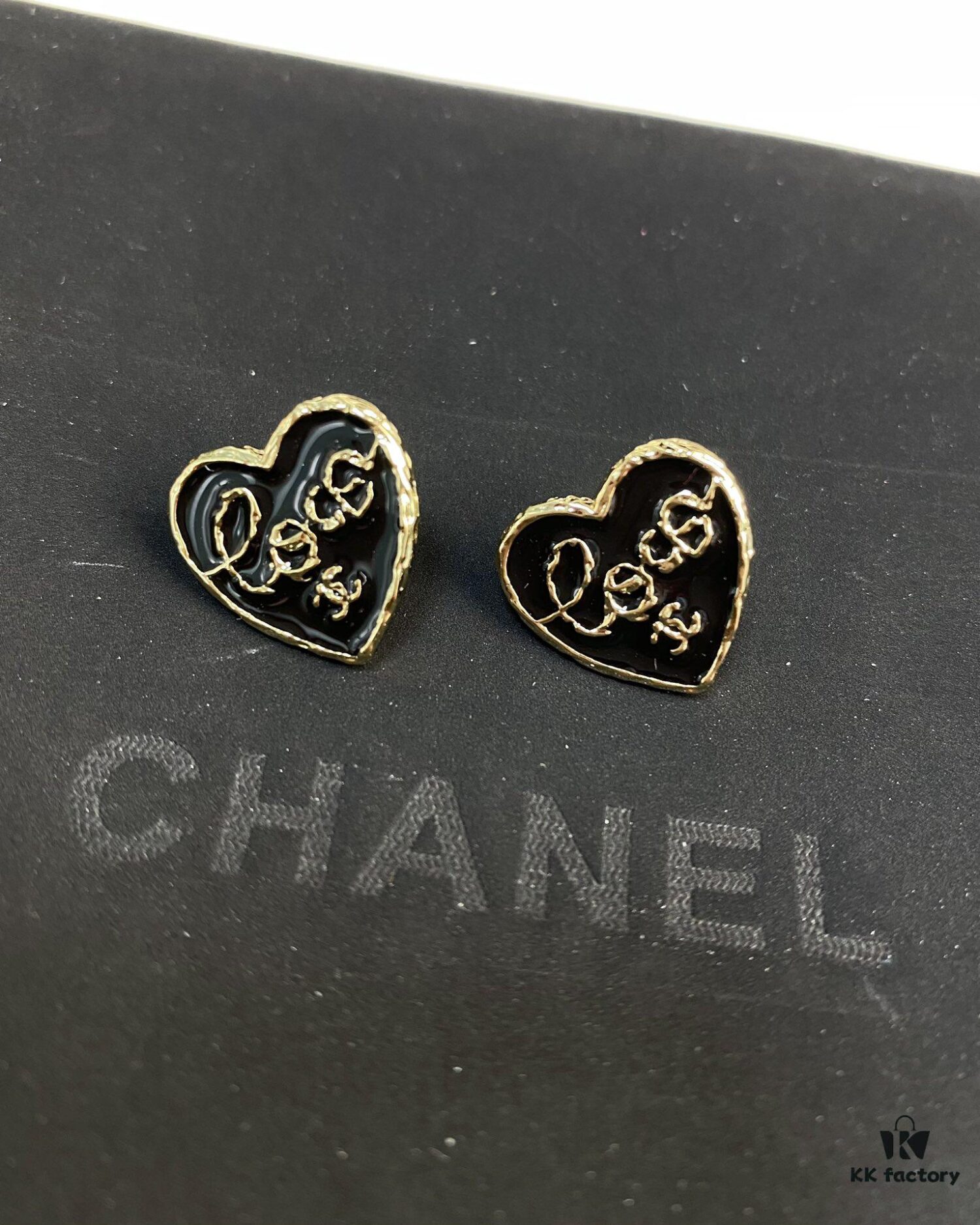 692ffe4b99f2d84055c8ea05 Chanel New Arrival Black Enamel Heart Earrings