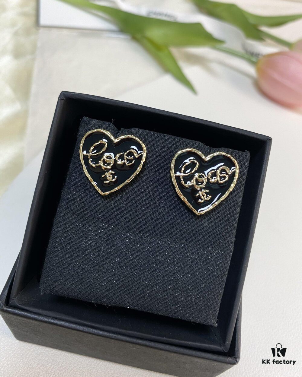 692ffe4c99f2d84055c8ea06 Chanel New Arrival Black Enamel Heart Earrings