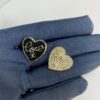 692ffe4e99f2d84055c8ea08 Chanel New Arrival Black Enamel Heart Earrings