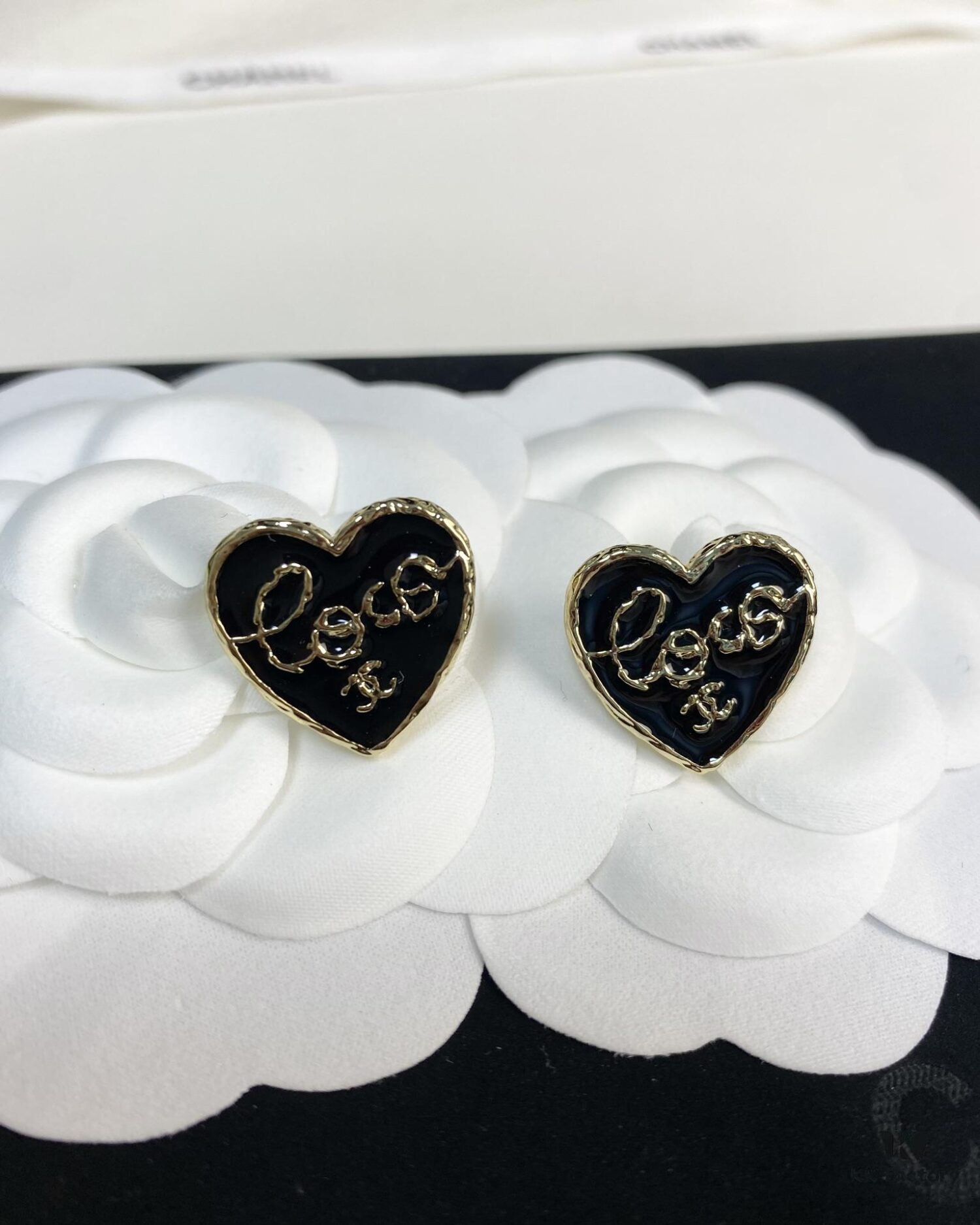 692ffe5099f2d84055c8ea0a Chanel New Arrival Black Enamel Heart Earrings