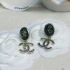 Xiaoxiang New Arrival Black Oval Lava Double C Earrings ✨