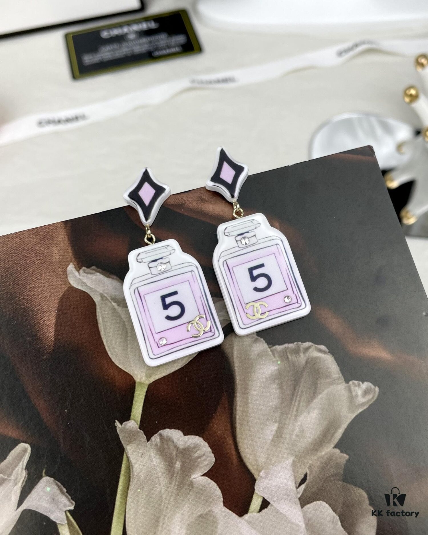 692fff2e99f2d84055c8eaca CHANE New Rhombus Pendant Perfume Bottle Resin Acrylic Stud Earrings