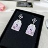 692fff2f99f2d84055c8eacc CHANE New Rhombus Pendant Perfume Bottle Resin Acrylic Stud Earrings