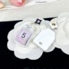 692fff3099f2d84055c8eace CHANE New Rhombus Pendant Perfume Bottle Resin Acrylic Stud Earrings