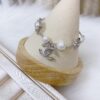 692fff8799f2d84055c8eb4e Chanel ZP Pearl Bracelet in Original Brass Material with Shell Beads