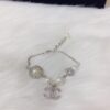 692fff8799f2d84055c8eb4f Chanel ZP Pearl Bracelet in Original Brass Material with Shell Beads