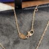 6930009199f2d84055c8ec63 New Black Color, Natural Black Onyx - SAMMY PARIS 'Yuan Yuan' Necklace, Small Crossed Circle Pendant, Symbolizing Perfect Union and Fulfilled Wishes