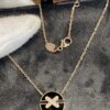 6930009499f2d84055c8ec65 New Black Color, Natural Black Onyx - SAMMY PARIS 'Yuan Yuan' Necklace, Small Crossed Circle Pendant, Symbolizing Perfect Union and Fulfilled Wishes