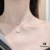 693000c999f2d84055c8eca9 Chaumet Paris Classic Cross, Small and Exquisite Design, Universally Flattering