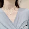 693000cc99f2d84055c8ecad Chaumet Paris Classic Cross, Small and Exquisite Design, Universally Flattering