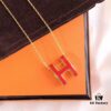 693002fd12f62673a6faac9c Hermès Enamel Curved H Necklace in Gold Tones