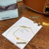 Cookie-shaped earrings, necklace, and pearl bracelet filled with love—how can anyone resist!