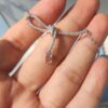 6930048b12f62673a6faafce HEFANG Aurora Ribbon Knot Pendant Necklace