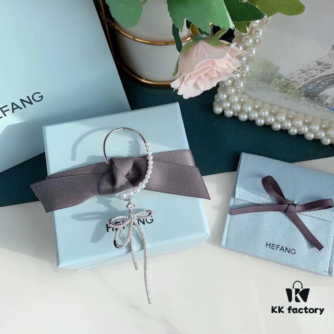 693004c612f62673a6fab064 HeFang Jewelry Pearl Bow Earrings, High-End Ear Clip Without Piercings, Reverse Hanging Design