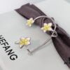 693004e912f62673a6fab0b8 HEFANG Jewelry Frangipani Huggie Earrings