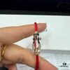 693005fa12f62673a6fab203 FRED Fred Bracelet, Medium Rose Gold Force 10 with Black and White Gemstones, Steel Cord Bracelet