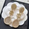 6930060912f62673a6fab218 Xiaoxiang New Sunflower Earrings, Luxury Full Diamond Pearl Drop Design, Elegant and Stylish for Daily Wear