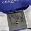 6930061b12f62673a6fab22f New Black Color, Natural Black Onyx - SAMMY PARIS 'Yuan Yuan' Necklace, Small Crossed Circle Pendant, Symbolizing Perfect Union and Fulfilled Wishes