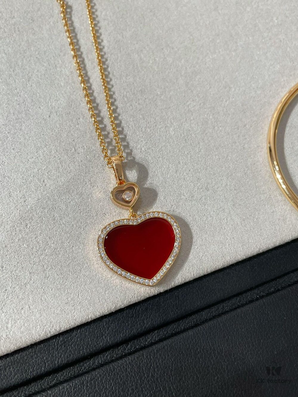 6930064212f62673a6fab266 Chopard Heart Necklace and Bracelet with Diamond Trimmings in New Year Red