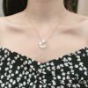 6930068612f62673a6fab2bf Chopard Angel Necklace with Lucky Symbol and Iconic Moving Diamond in 18K Rose Gold, Adjustable Chain with Original Logo and Authentic Tag