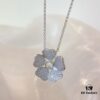 6930074312f62673a6fab3e3 Chopard Happy Hearts Flowers Necklace featuring a signature heart motif adorned with five diamond petals encircling a dancing diamond, exuding elegance and charm
