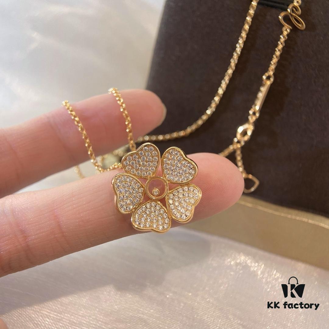 6930074312f62673a6fab3e5 Chopard Happy Hearts Flowers Necklace featuring a signature heart motif adorned with five diamond petals encircling a dancing diamond, exuding elegance and charm