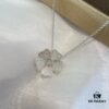 6930074412f62673a6fab3e7 Chopard Happy Hearts Flowers Necklace featuring a signature heart motif adorned with five diamond petals encircling a dancing diamond, exuding elegance and charm