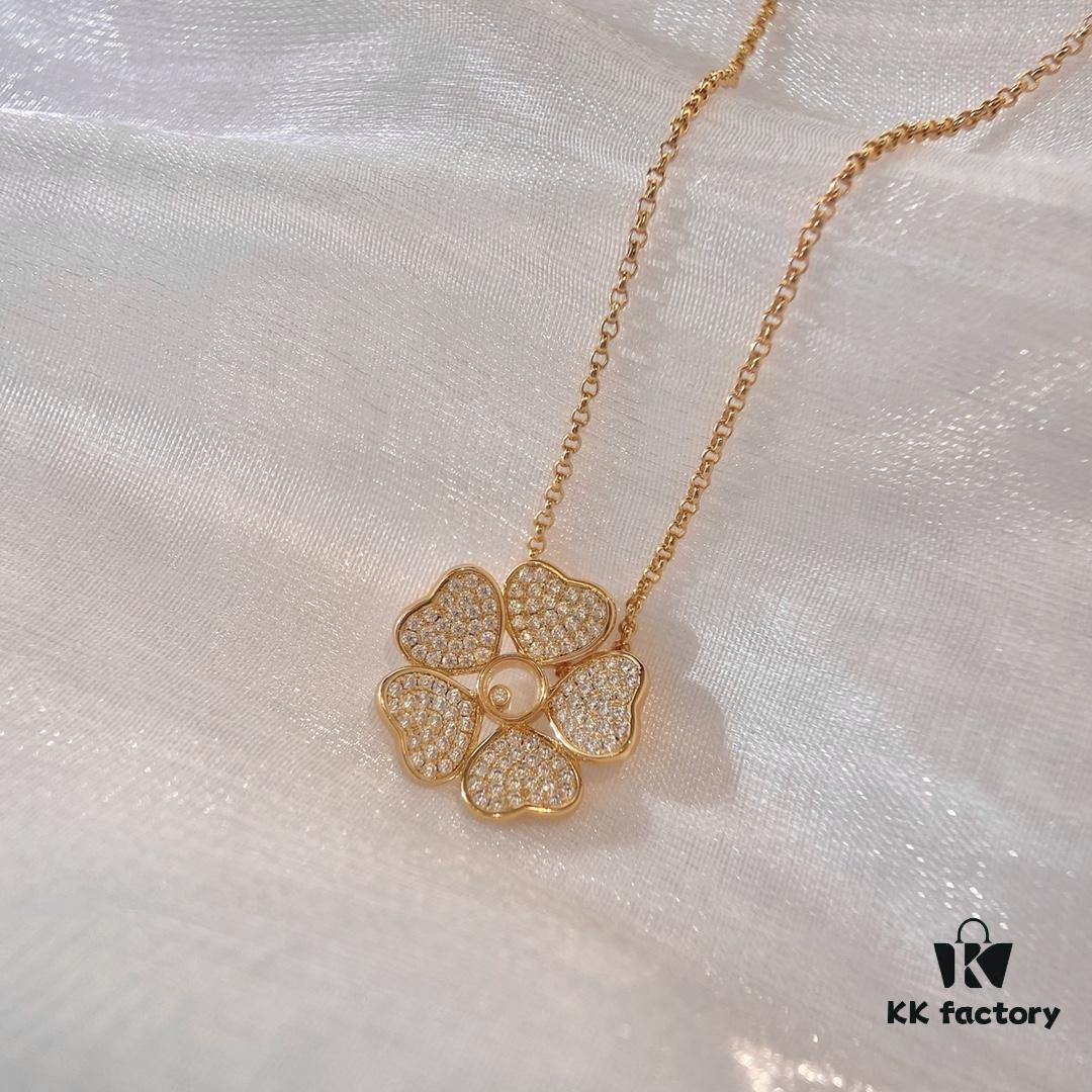 6930074c12f62673a6fab3f4 Chopard Happy Hearts Flowers Necklace featuring a signature heart motif adorned with five diamond petals encircling a dancing diamond, exuding elegance and charm