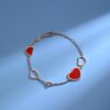 6930074e12f62673a6fab3f8 Chopard-style Heart Bracelet with Symbolic Design - Interconnected Hearts