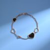 6930074f12f62673a6fab3f9 Chopard-style Heart Bracelet with Symbolic Design - Interconnected Hearts